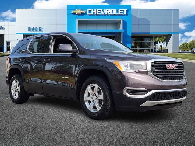 2019 GMC Acadia SLE in Iridium Metallic — front three-quarter view