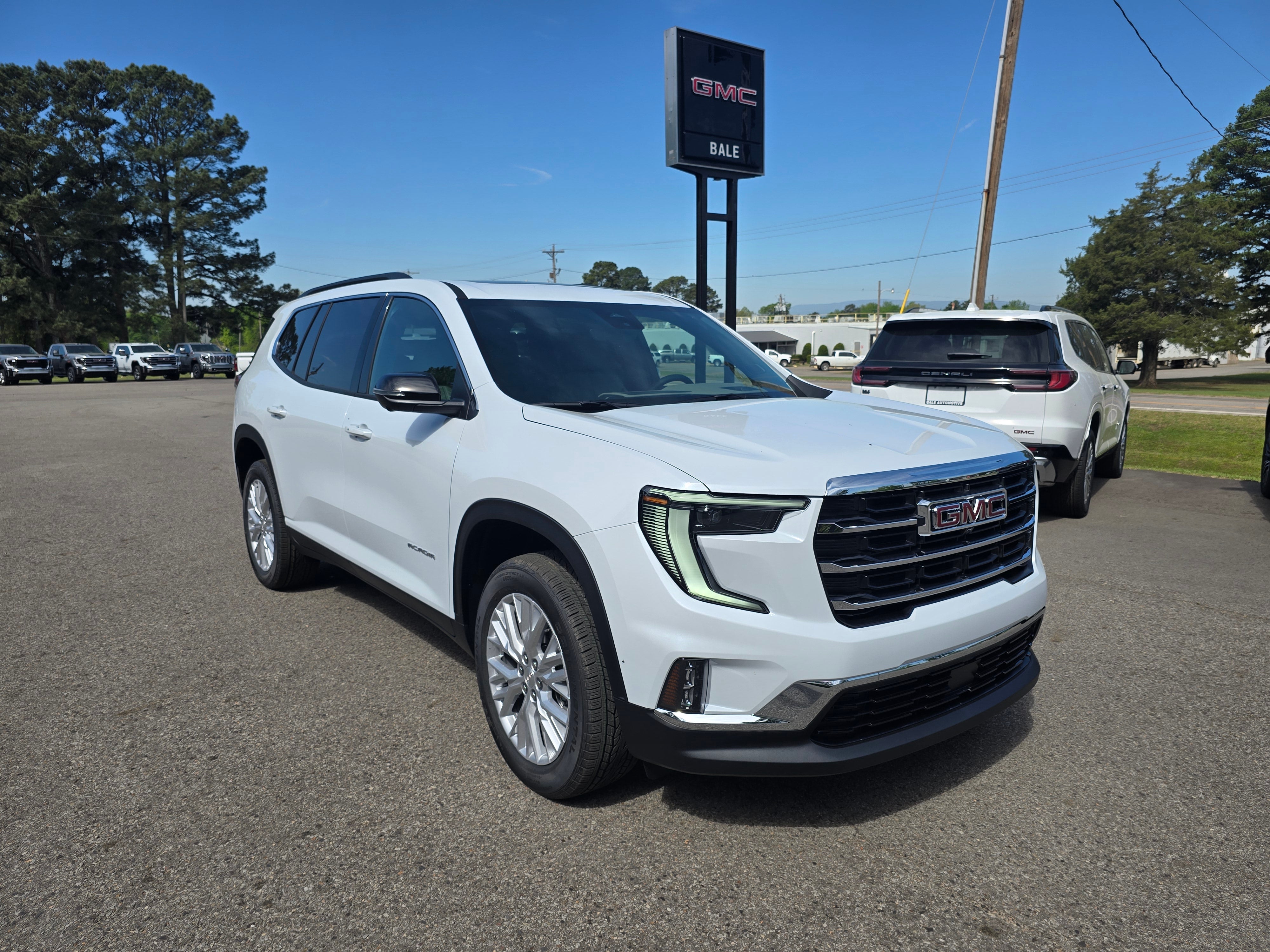 2026 GMC Acadia Elevation in Glacier White Tricoat — front three-quarter view