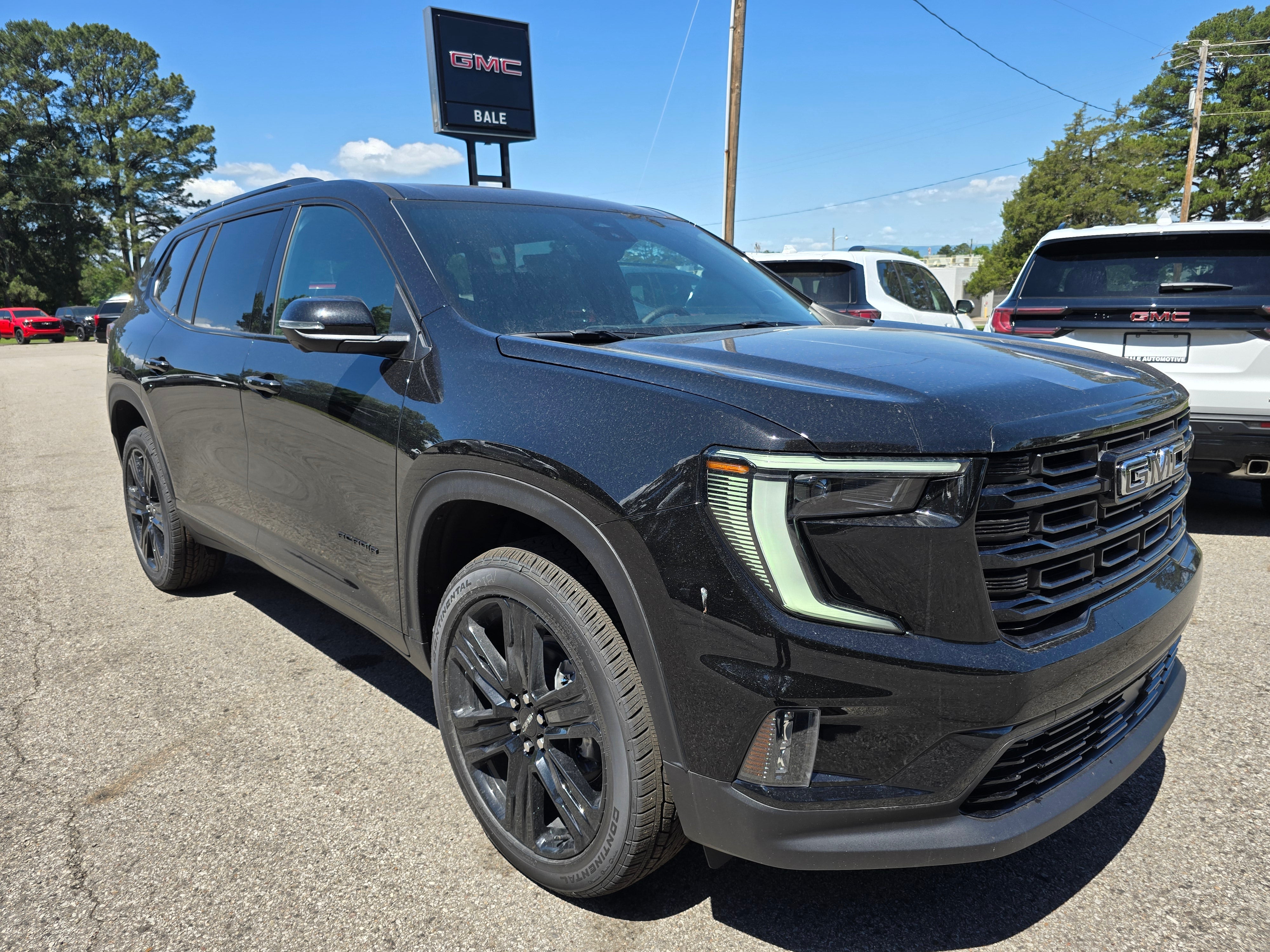 2026 GMC Acadia Elevation in Ebony Twilight Metallic — front three-quarter view