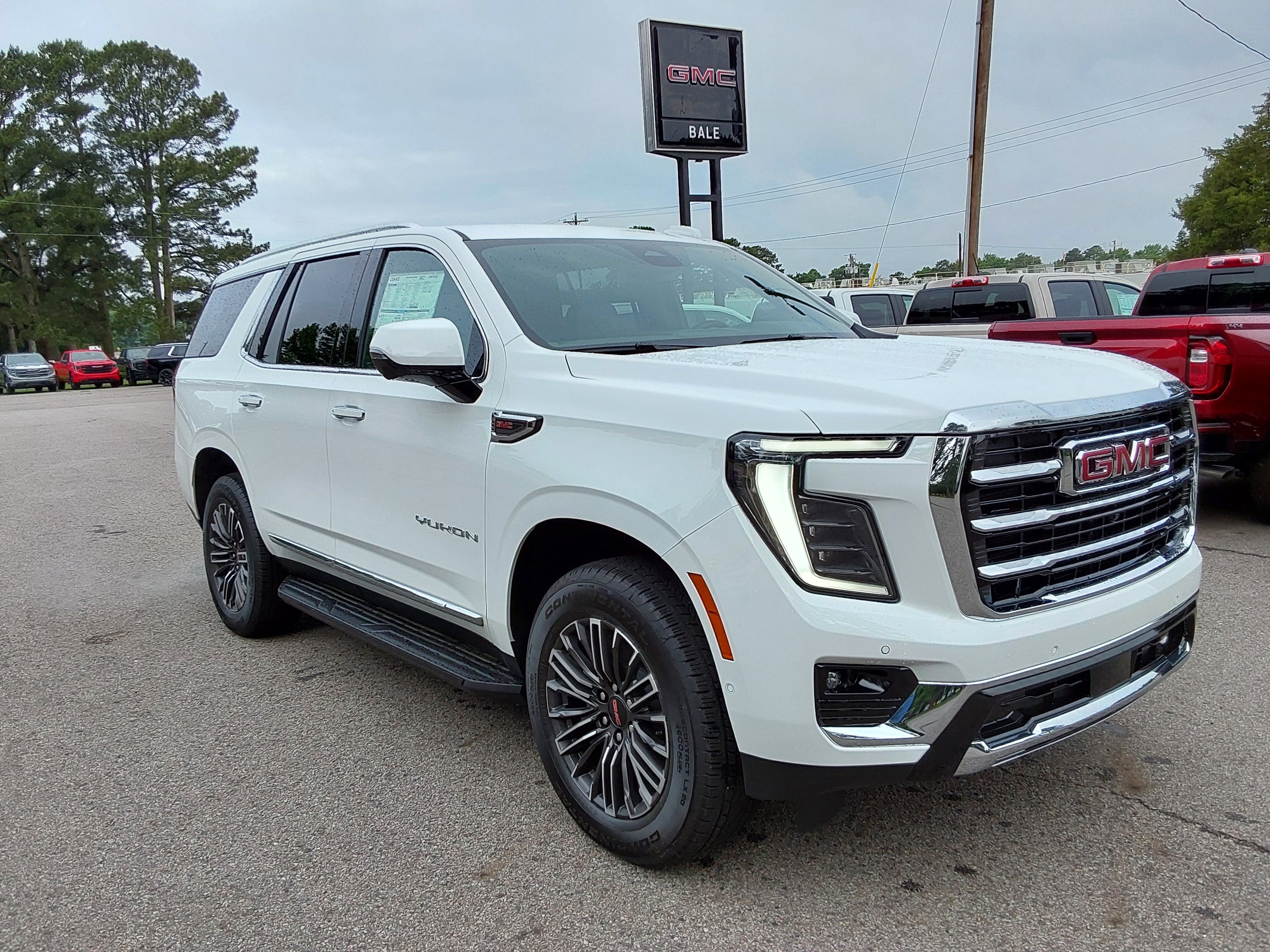 2026 GMC Yukon Elevation in Summit White — front three-quarter view