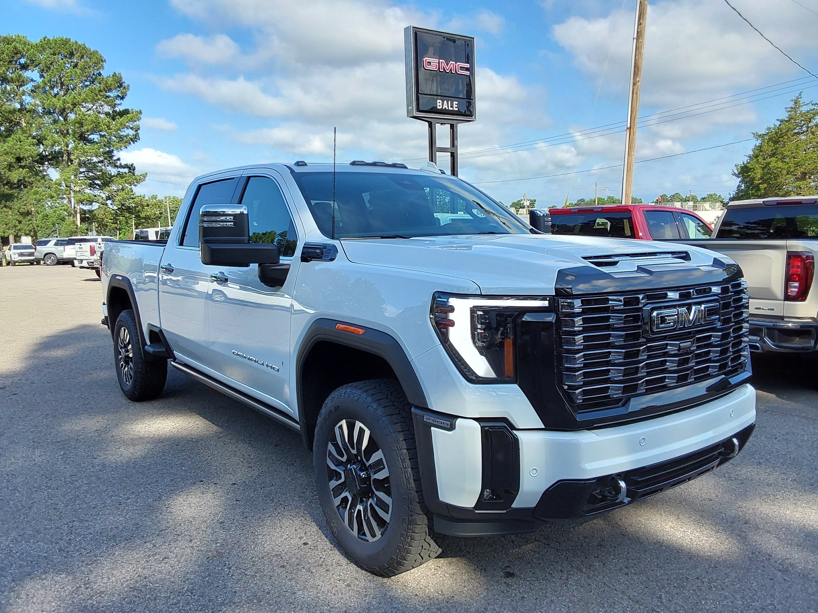 2026 GMC Sierra 2500 HD Denali Ultimate in Summit White — front three-quarter view