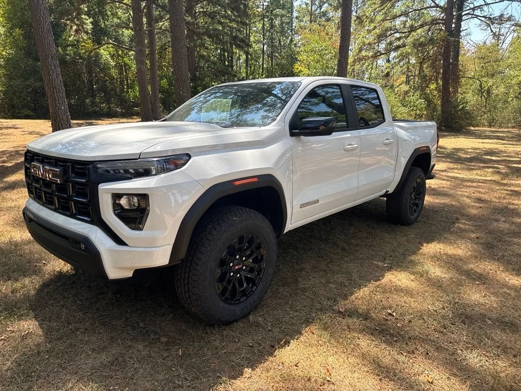 2026 GMC Canyon Elevation in Summit White — front three-quarter view